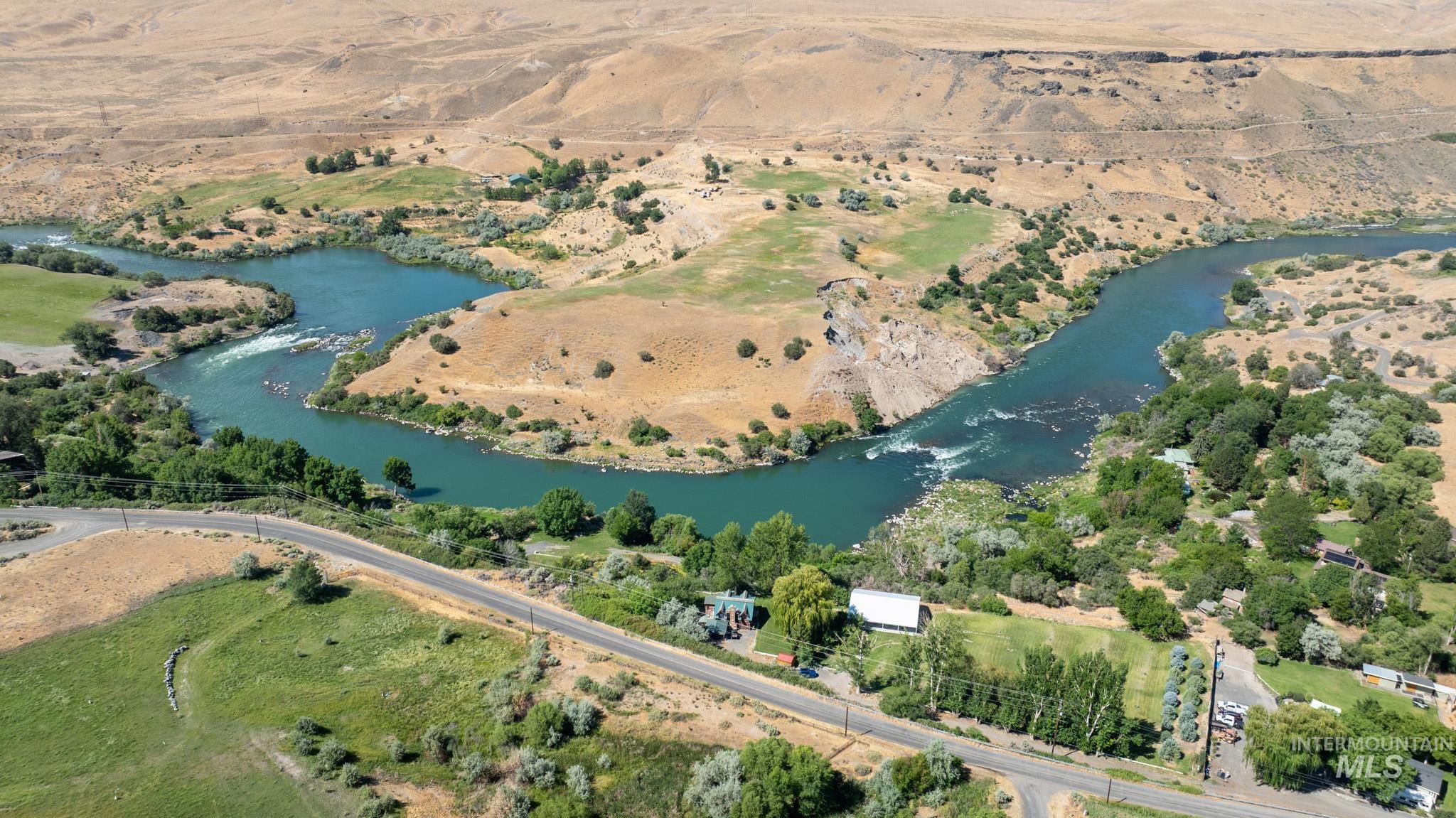 863 Pottery Road Bliss, ID 83314 - Photo 30 of 45 Riverfront property featuring a significant bend in the waterway and surrounding arid landscape