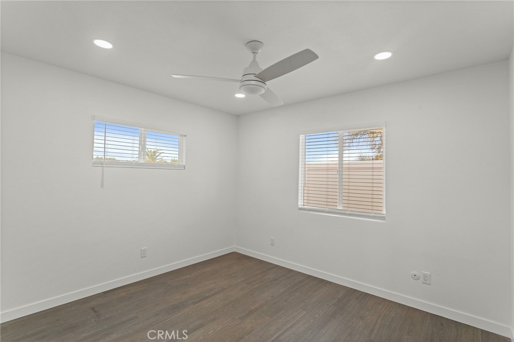 9219 Colorado Avenue Riverside, CA 92503 - Photo 20 of 30 an empty room with a window and ceiling fan