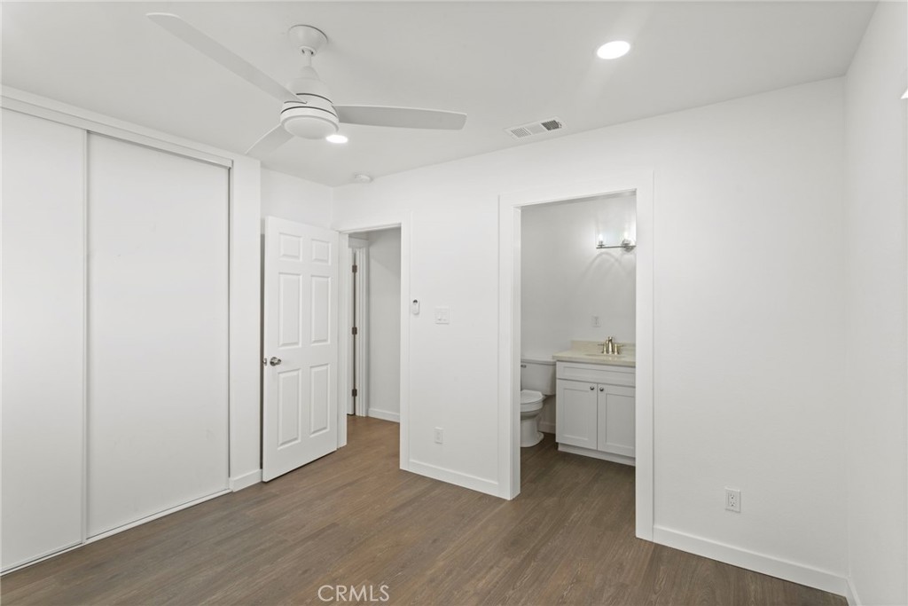 9219 Colorado Avenue Riverside, CA 92503 - Photo 21 of 30 wooden floor in an empty room with a window