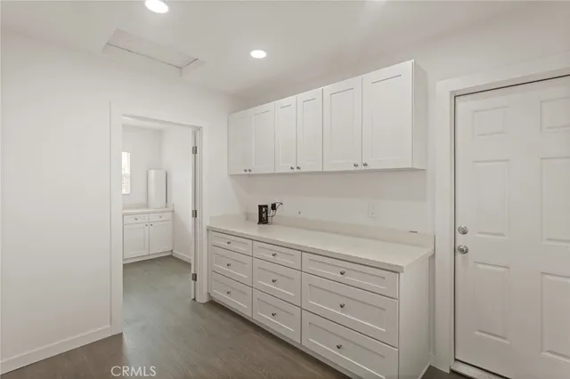 a view of cabinets and window