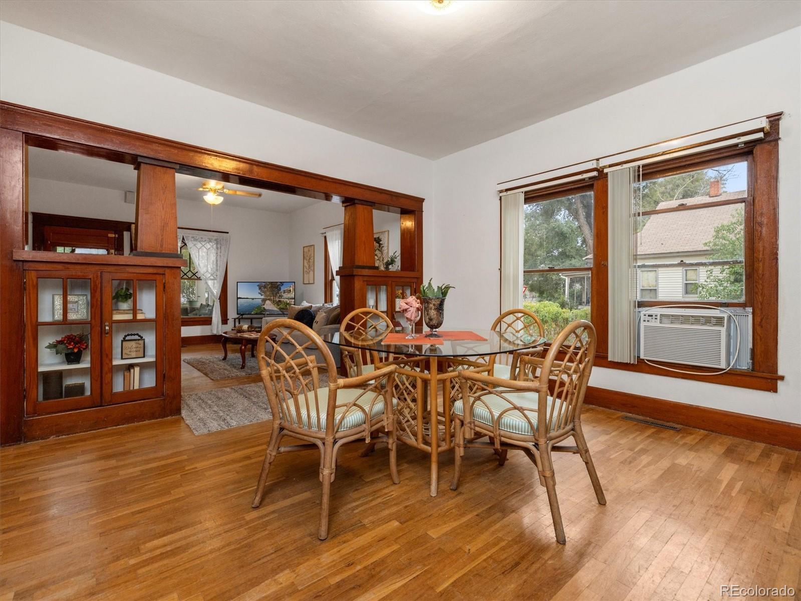 708 7th Street Fowler, CO 81039 - Photo 14 of 17 a view of a dining room with furniture window and wooden floor
