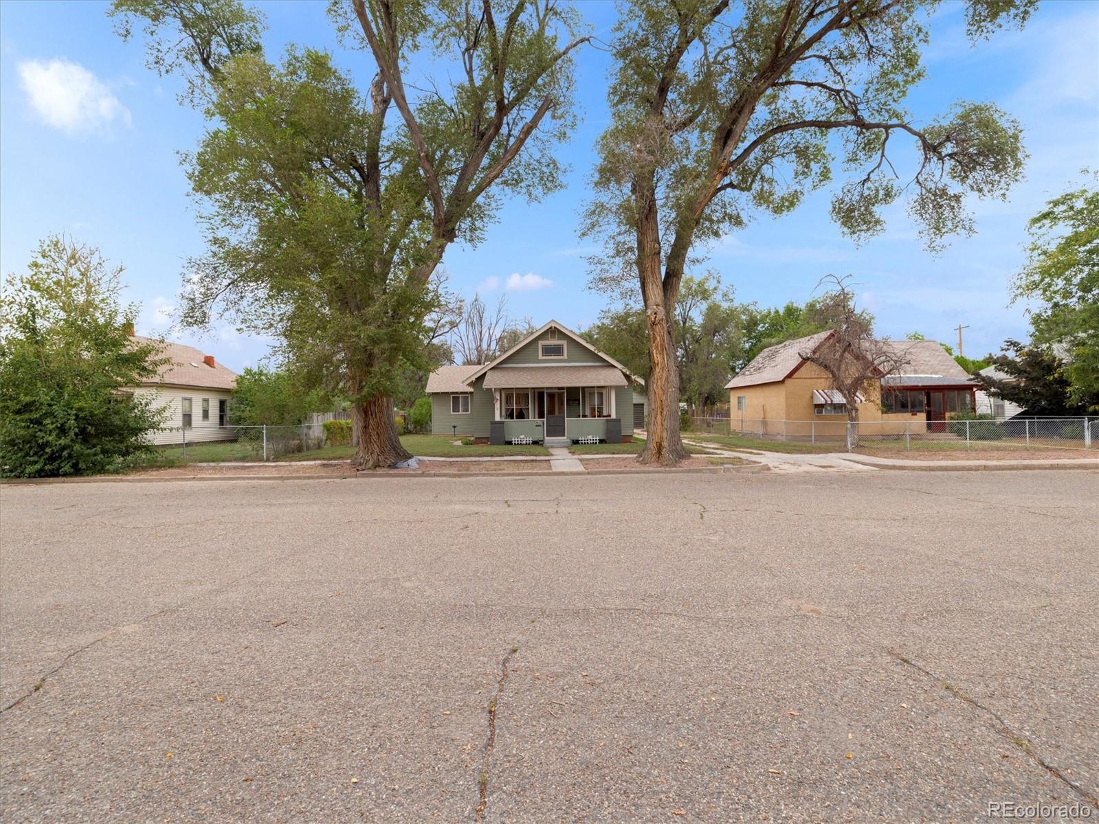 708 7th Street Fowler, CO 81039 - Photo 2 of 17 a view of house with outdoor space and tree
