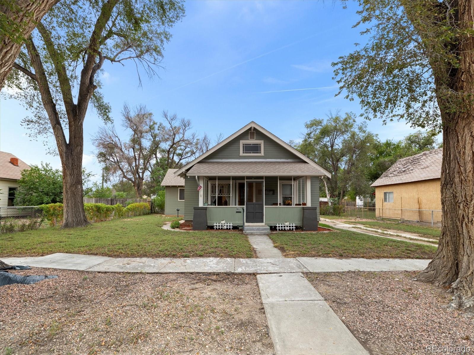 708 7th Street Fowler, CO 81039 - Photo 3 of 17 a front view of a house with a yard