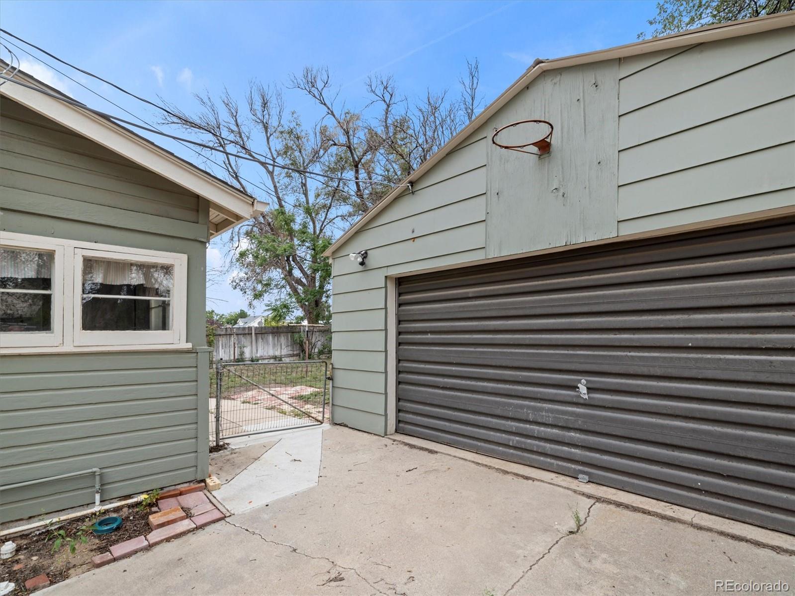 708 7th Street Fowler, CO 81039 - Photo 5 of 17 a view of a house with a garage