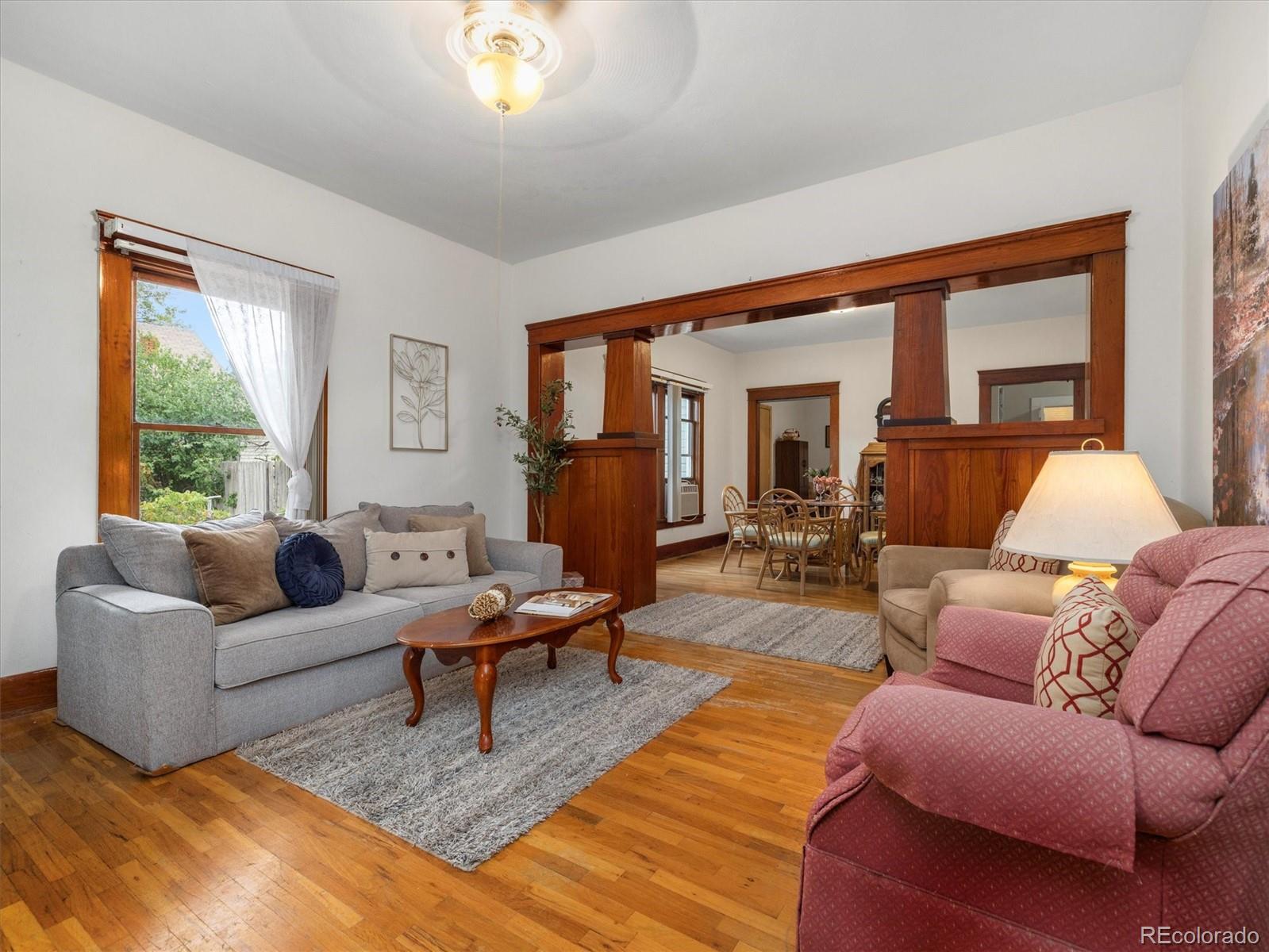 708 7th Street Fowler, CO 81039 - Photo 9 of 17 a living room with furniture and a large window