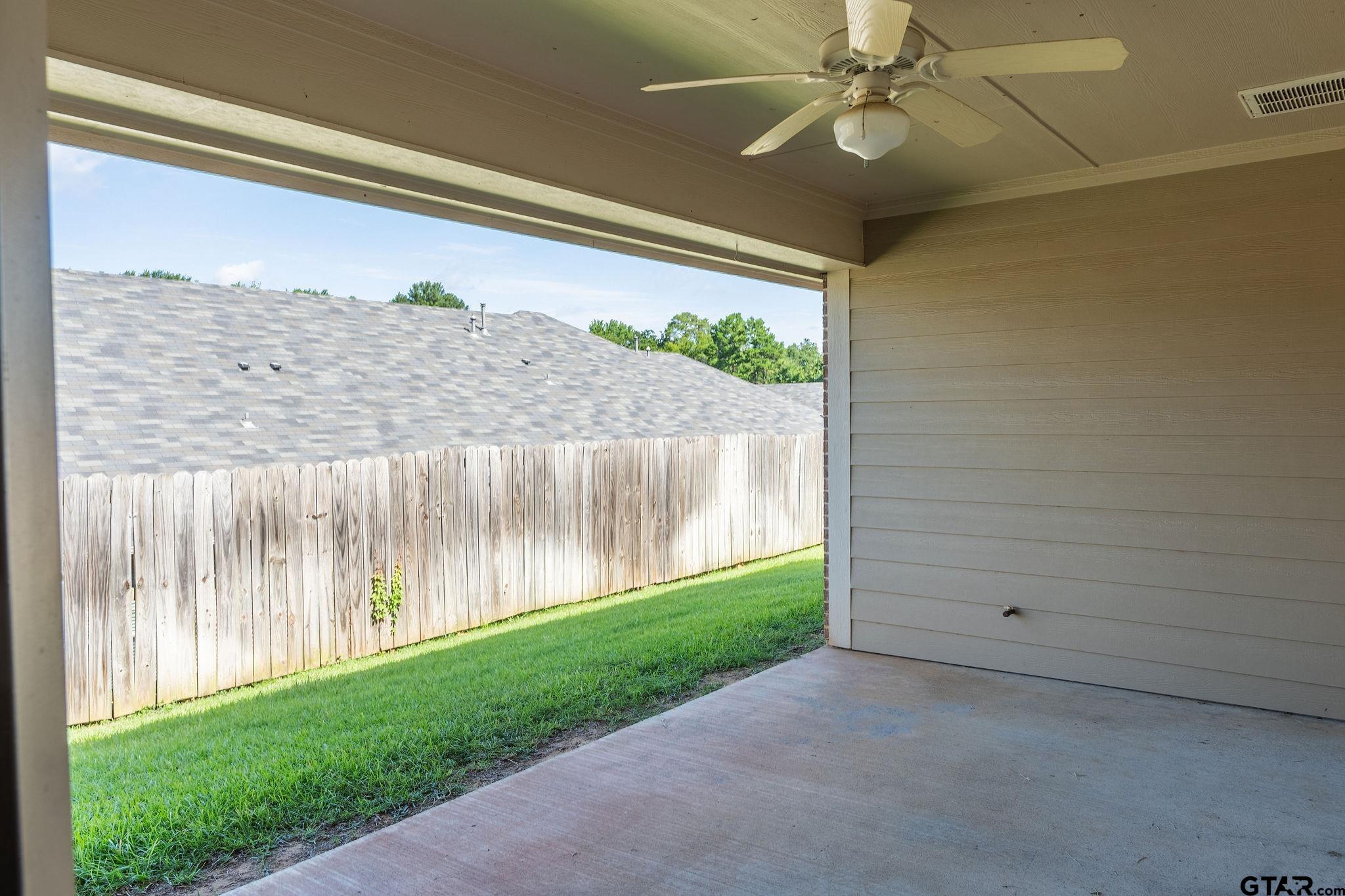 421 West Cumberland Road, Unit 703 Tyler, TX 75703 - Photo 25 of 29 a view of a porch with a yard