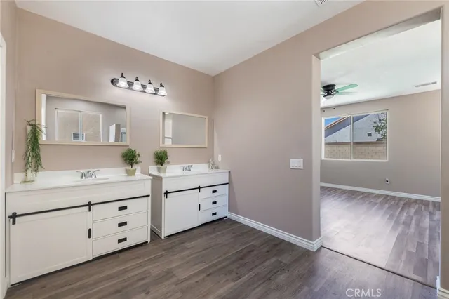 a view of entryway with wooden floor and stairs