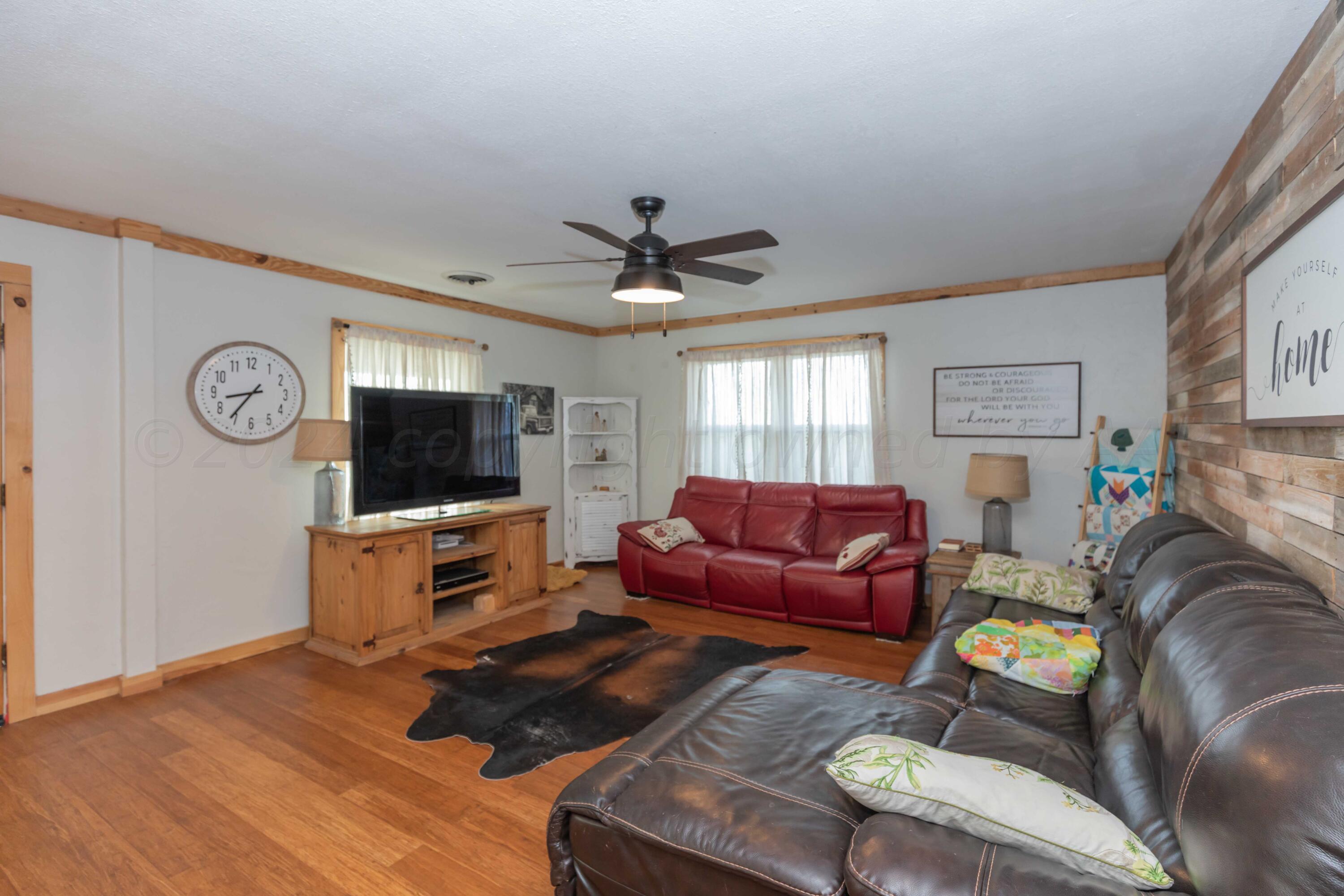 4825 Highway 207 Claude, TX 79019 - Photo 4 of 53 LIVING ROOM VIEW 2