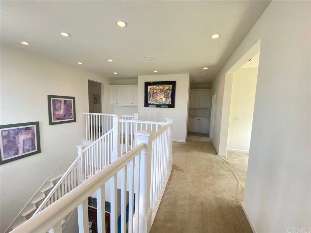 149 Allium Irvine, CA 92618 - Photo 11 of 26 a view of a hallway with a hallway