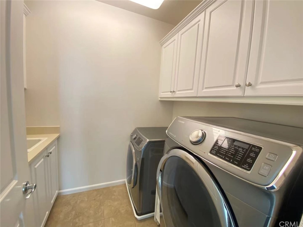 149 Allium Irvine, CA 92618 - Photo 15 of 26 a utility room with dryer and washer