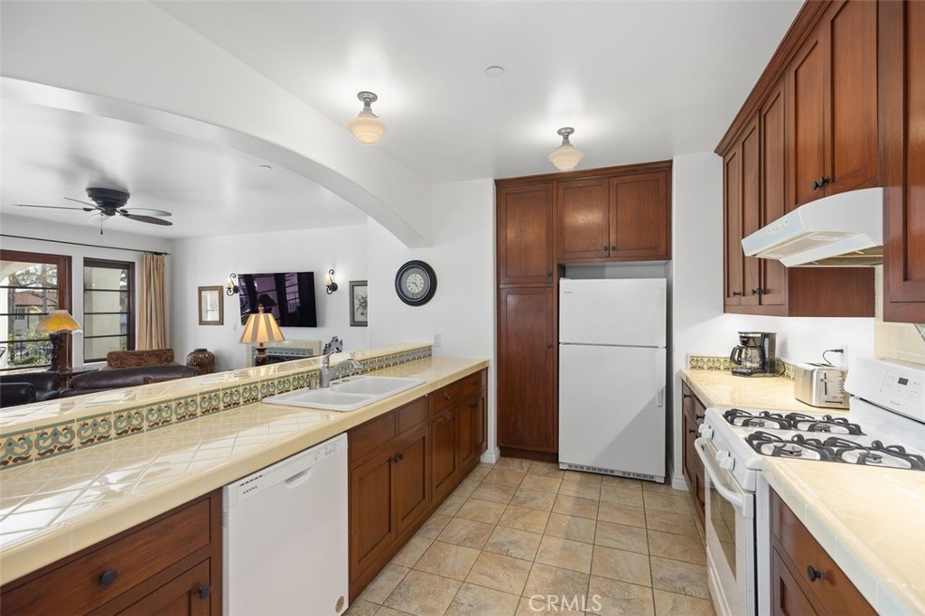 240 Avenida Rosa, Unit B San Clemente, CA 92672 - Photo 17 of 31 Kitchen with beautiful Spanish tiles.