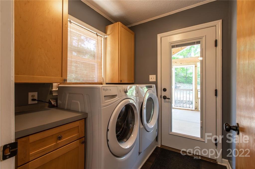 209 Fallingtree Lane Monroe, NC 28112 - Photo 11 of 22 a utility room with dryer and washer