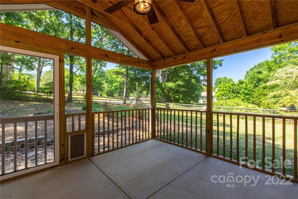 209 Fallingtree Lane Monroe, NC 28112 - Photo 18 of 22 a balcony with trees in front of it