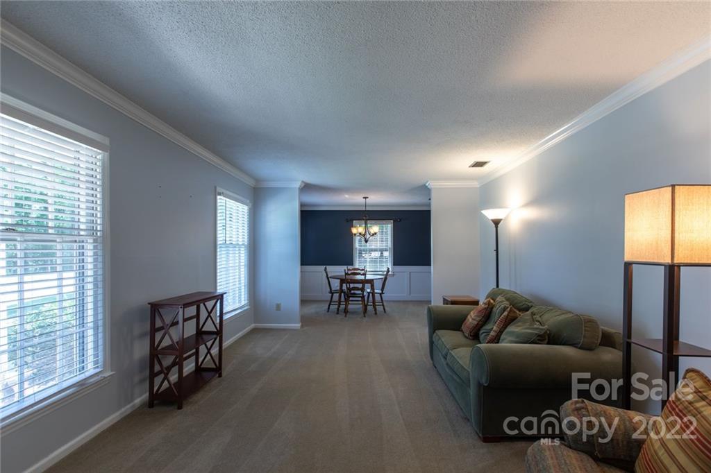 209 Fallingtree Lane Monroe, NC 28112 - Photo 3 of 22 a living room with furniture and a large window