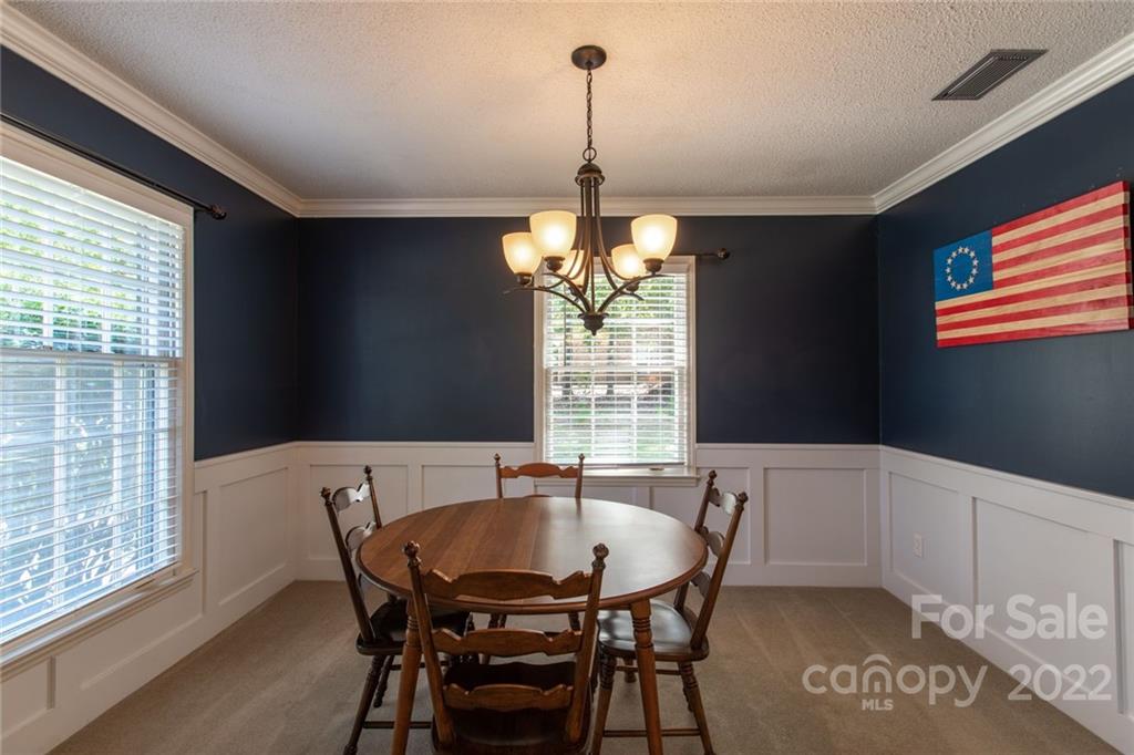 209 Fallingtree Lane Monroe, NC 28112 - Photo 5 of 22 a dining room with furniture and window