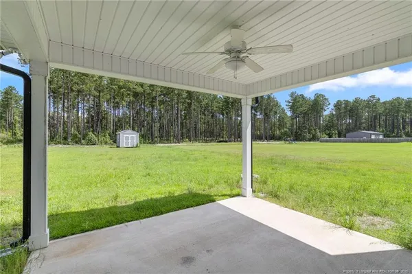 a view of a porch with a backyard