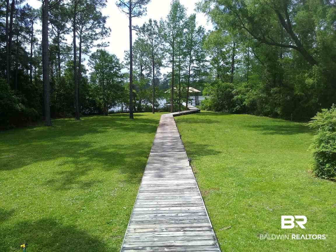 8132 Bay View Drive Foley, AL 36535 - Photo 38 of 50 Back yard toward bay