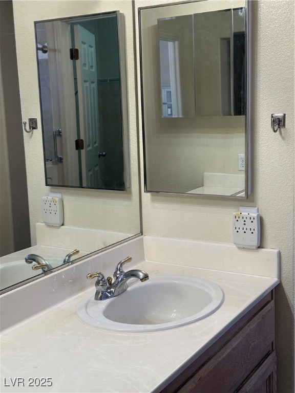 495 Edgefield Ridge Place Henderson, NV 89012 - Photo 13 of 16 Bathroom featuring vanity