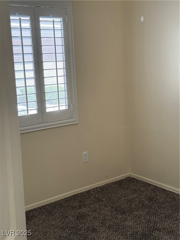 495 Edgefield Ridge Place Henderson, NV 89012 - Photo 14 of 16 Carpeted spare room with plenty of natural light