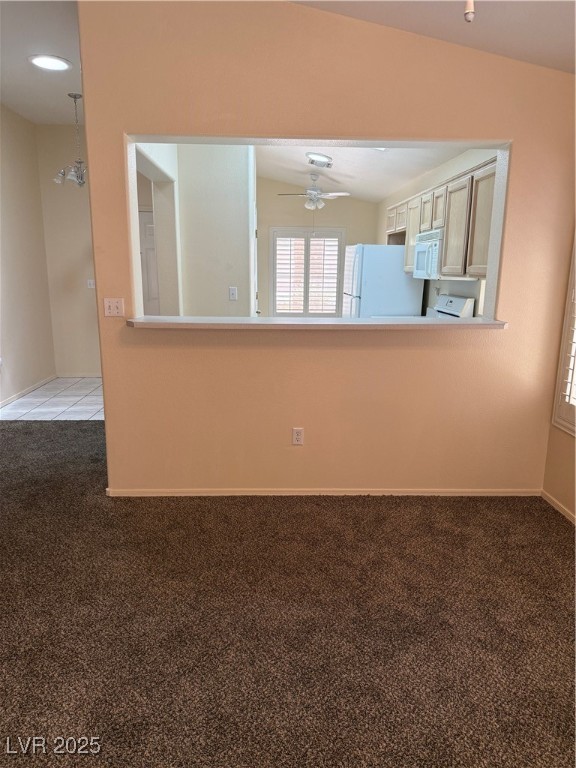 495 Edgefield Ridge Place Henderson, NV 89012 - Photo 4 of 16 Empty room featuring carpet and a ceiling fan