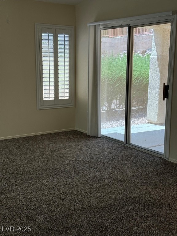 495 Edgefield Ridge Place Henderson, NV 89012 - Photo 6 of 16 Spare room featuring carpet and baseboards
