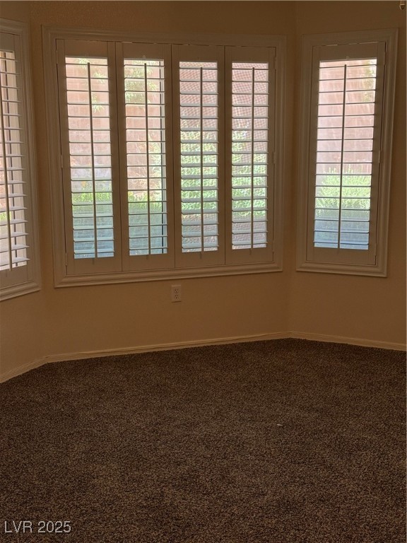 495 Edgefield Ridge Place Henderson, NV 89012 - Photo 10 of 16 Carpeted empty room with healthy amount of natural light