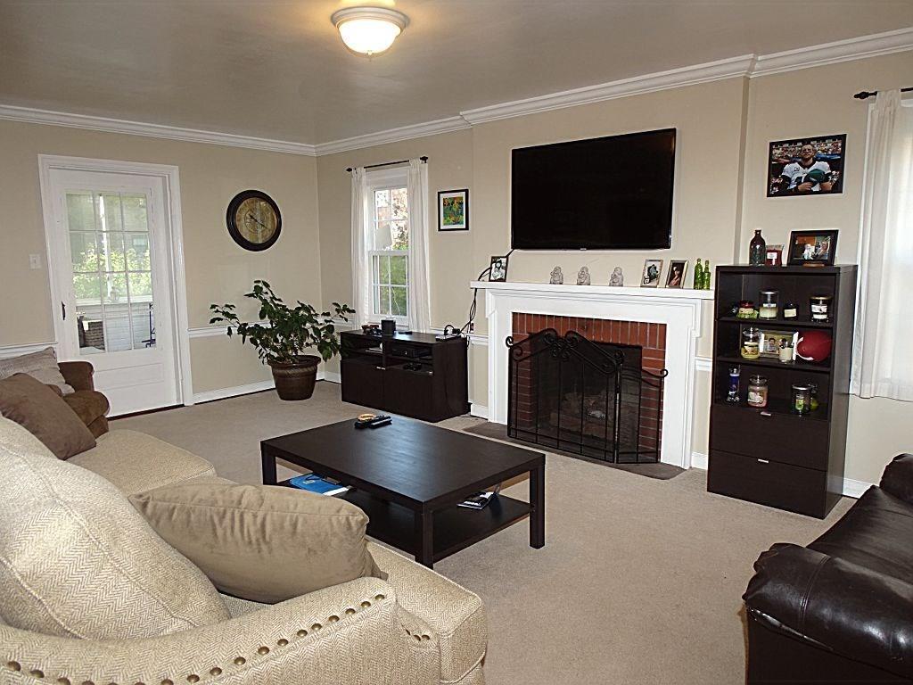 2374 Collins Road Pittsburgh, PA 15235 - Photo 6 of 25 Large open living room with attached sunroom