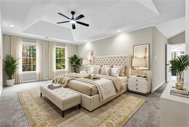 a bed room with bed and a large window