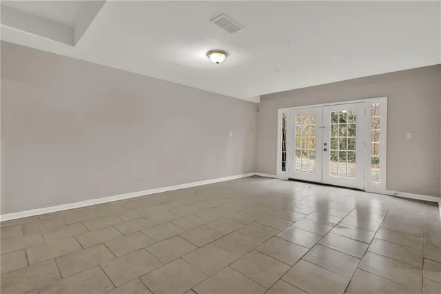 an empty room with windows