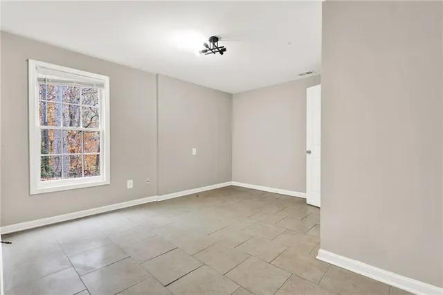 an empty room with windows