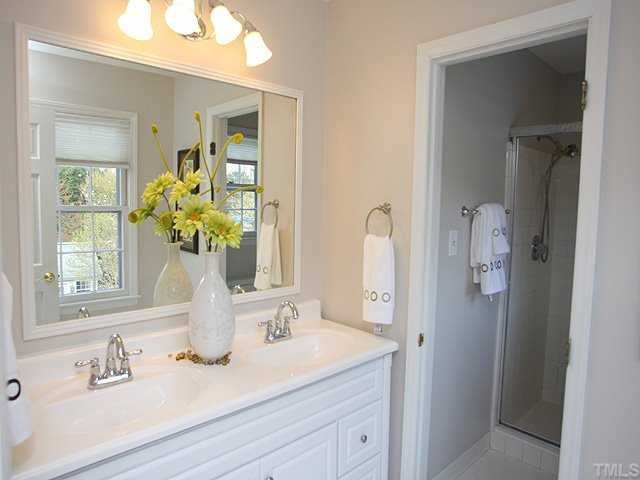 6808 Garrison Court Raleigh, NC 27613 - Photo 11 of 20 Updated master bath with new vanity, lights and paint. Master Bath/Spa