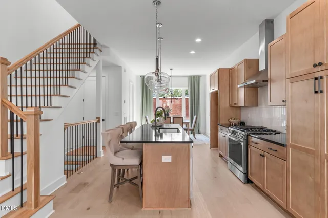 a kitchen with kitchen island granite countertop lots of counter top space