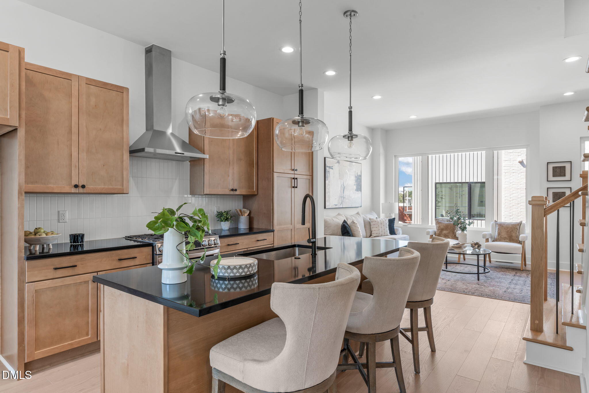 2010 Moody Durham, NC 27701 - Photo 7 of 45 a dining room with furniture a potted plant and open kitchen view
