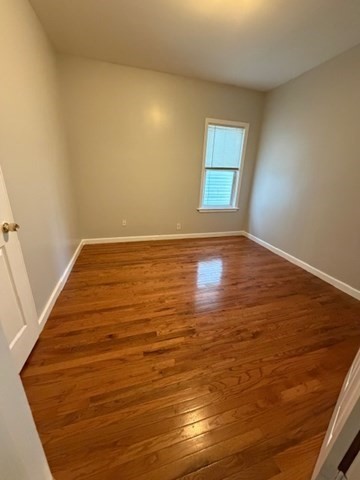 137 Tecumseh Street, Unit 2 Fall River, MA 02721 - Photo 7 of 11 a view of an empty room and window
