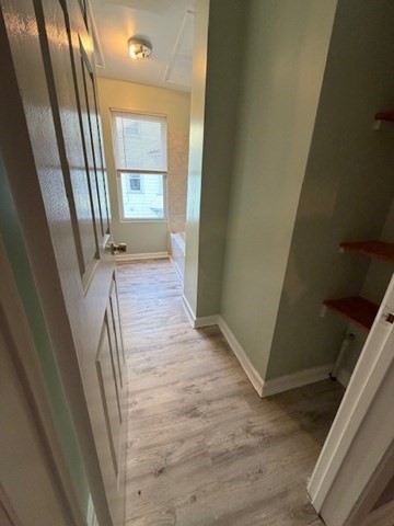 137 Tecumseh Street, Unit 2 Fall River, MA 02721 - Photo 9 of 11 a view of an entryway door with wooden floor