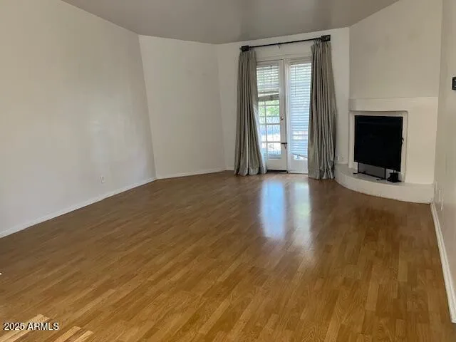 a kitchen with a sink cabinets and a window