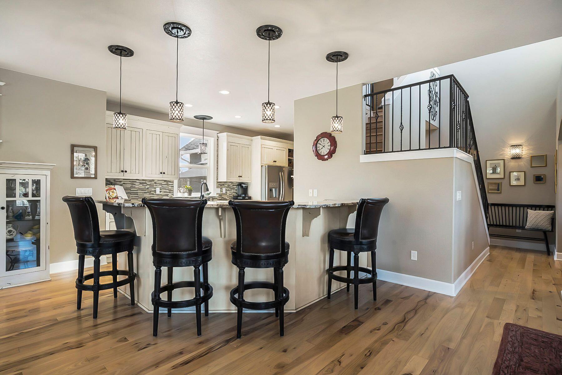21530 Dale Road Bend, OR 97701 - Photo 12 of 46 a view of a dining room with furniture and wooden floor
