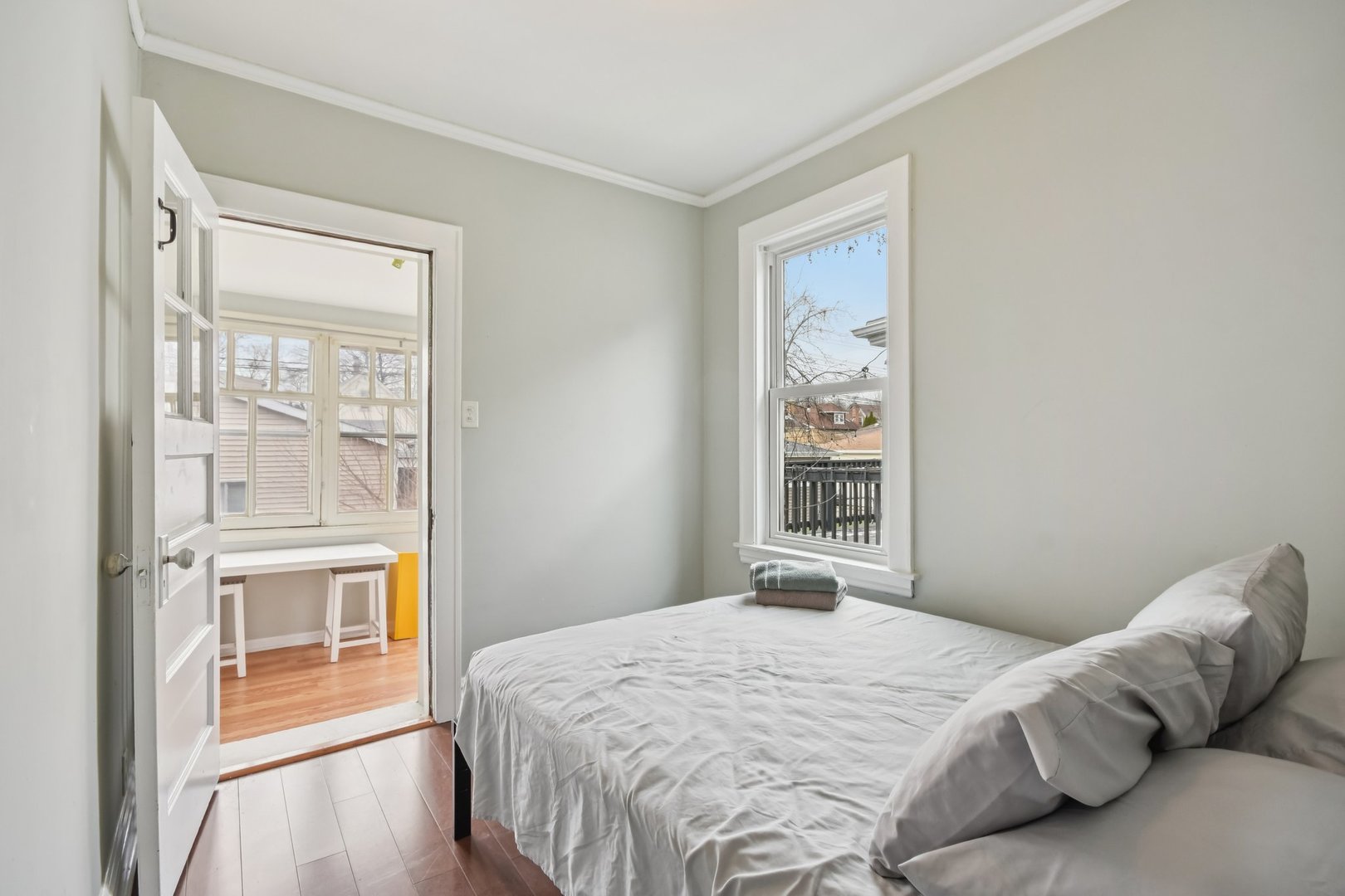 2928 North Rutherford Avenue Chicago, IL 60634 - Photo 9 of 25 a bedroom with a bed and a window