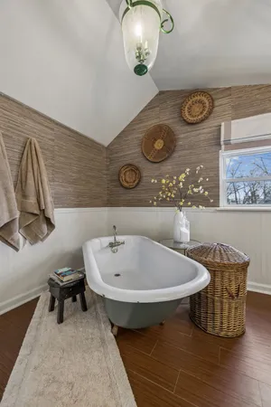 a bathroom with a sink and mirror