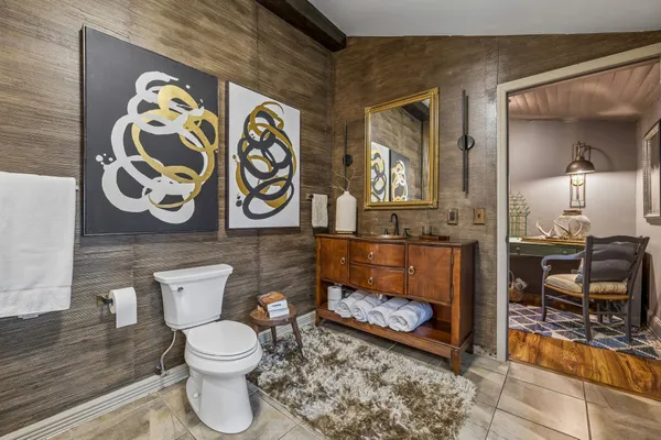 a bathroom with a toilet and a sink