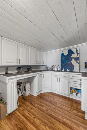 a kitchen with stainless steel appliances granite countertop a sink and cabinets