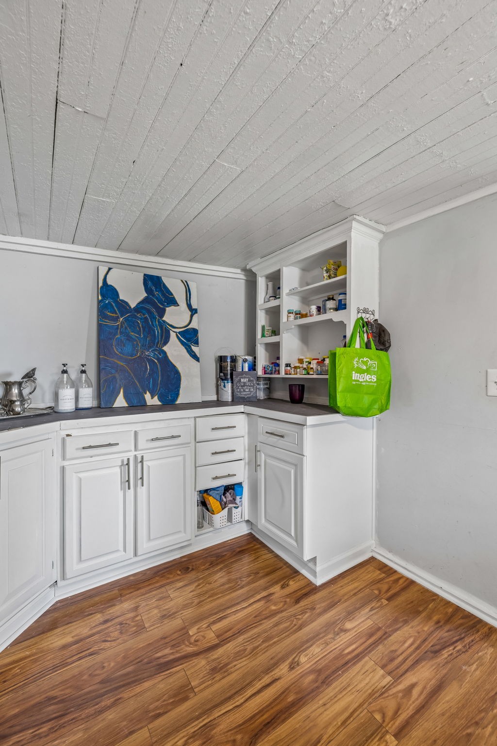 500 5th Avenue East Springfield, TN 37172 - Photo 36 of 45 a kitchen with stainless steel appliances white cabinets and wooden floor