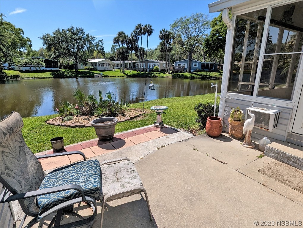 708 Navigators Way Edgewater, FL 32141 - Photo 21 of 26 an outdoor space with lounge chairs