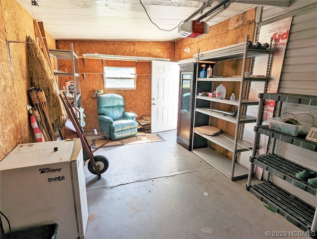 708 Navigators Way Edgewater, FL 32141 - Photo 25 of 26 a view of store room with clothes