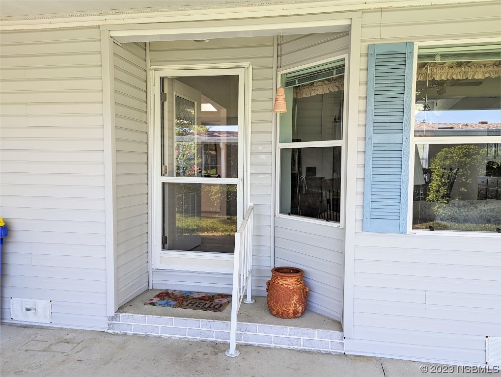 708 Navigators Way Edgewater, FL 32141 - Photo 26 of 26 a view of a entryway of the house