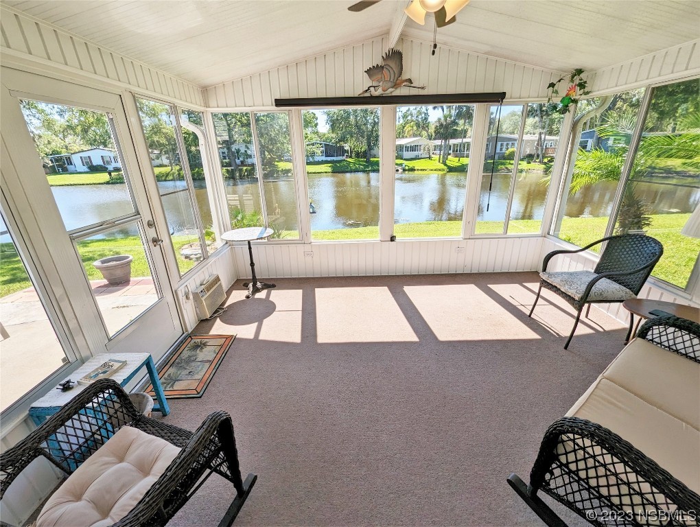 708 Navigators Way Edgewater, FL 32141 - Photo 6 of 26 a living room with furniture and a large window