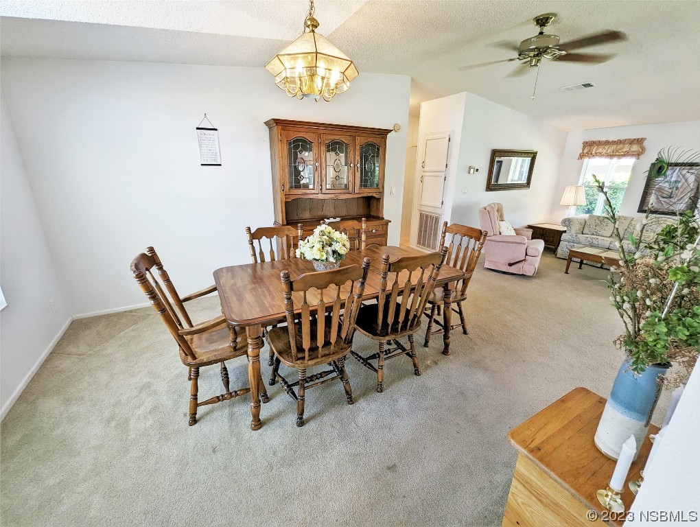 708 Navigators Way Edgewater, FL 32141 - Photo 8 of 26 a view of a livingroom and dining room