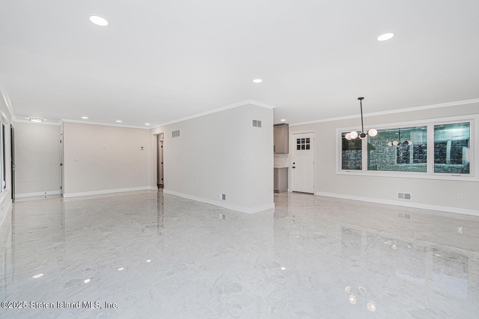 113 Longview Road Staten Island, NY 10304 - Photo 21 of 35 a view of an empty room with a window