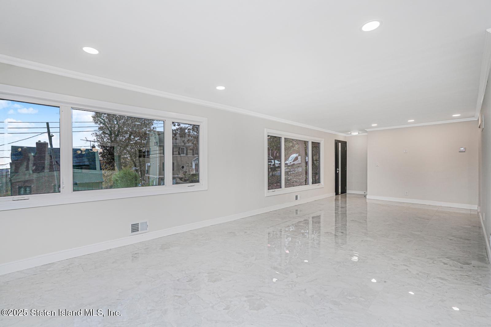 113 Longview Road Staten Island, NY 10304 - Photo 24 of 35 a view of an empty room with a window