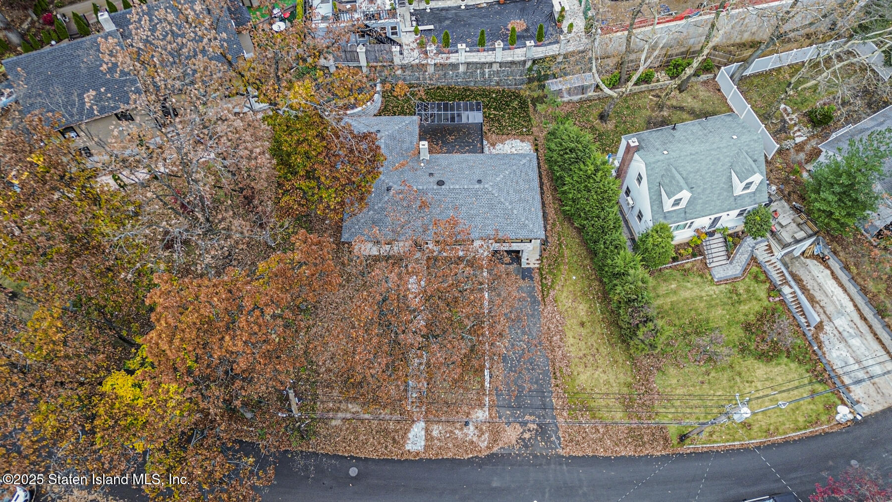 113 Longview Road Staten Island, NY 10304 - Photo 35 of 35 an aerial view of a house with a yard large trees